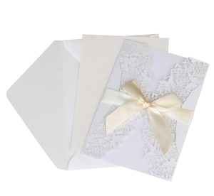 Pink laser cut wedding invitation set with elegant butterfly lace and cream ribbon bow