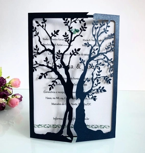 Detailed laser-cut tree of life design on high-quality black cardstock invitation