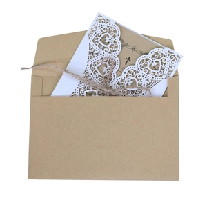 Rustic laser cut wedding invitation set with brown kraft envelope and natural twine