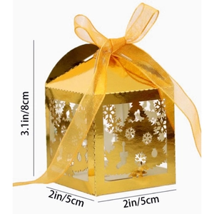 Laser-cut golden Christmas tree gift box with intricate snowflake patterns and yellow ribbon