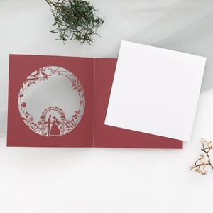 Elegant red laser-cut wedding invitation card with romantic bride and groom silhouette