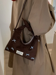 Retro brown suede dumpling bag with blue bows and striped lining for women