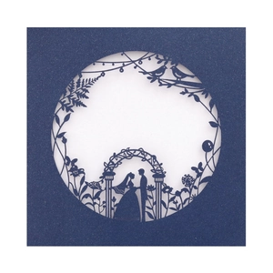 Navy blue pearl paper wedding invitation featuring a laser-cut romantic silhouette design