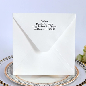 Custom white square wedding invitation envelope with elegant handwritten calligraphy print