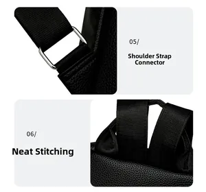 Detail of silver buckles and fine stitching on a black lychee grain leather backpack