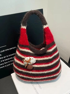 French style knitted striped bucket bag with mushroom patch and vibrant red brown stripes