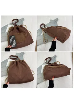 Detailed views showing the brown suede tote bag with heart patch and drawstring details