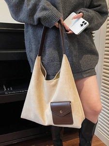 Borsa tote minimalista in pelle scamosciata beige con tasca in pelle marrone