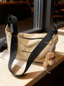 Retro beige suede large capacity shoulder bag with wide nylon strap and plush dog charm