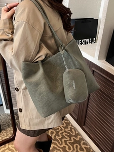 Olive green large capacity tote bag with matte texture and matching small pouch