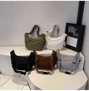 Five assorted nylon crescent shoulder bags in military green, white, black, coffee, and grey