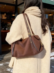 Brown matte suede Boston shoulder bag for women with adjustable straps and gold metal hardware