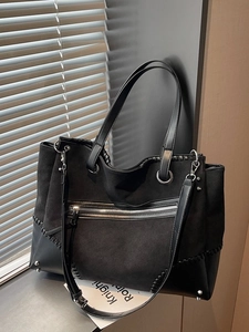 Large black tote bag in matte suede and leather with front pocket and studs