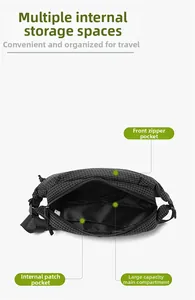 Detail view of black checkered waterproof waist bag with internal mesh compartments