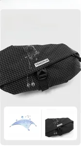 Detail of waterproof nylon crossbody bag showing the durable texture and buckle closure