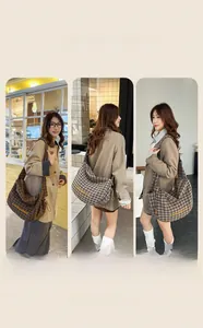 Detailed views of large plaid canvas shoulder bags in dark coffee and light gray tones