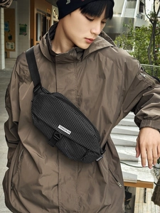 Waterproof black grid crossbody chest bag with adjustable strap and buckle for urban style