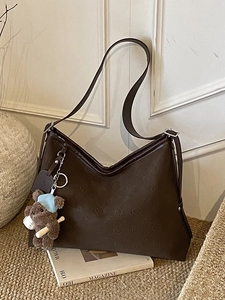 Retro dark brown large tote bag with embossed pattern and cute bear charm accessory