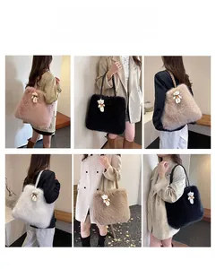 Detail of plush faux fur tote bag showing textured strap and cute teddy bear charm
