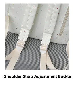 Close-up of adjustable shoulder strap buckle on star pattern backpack for school girls
