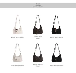 Hobo bag collection in white, ebony, and black with options for charms or basic style