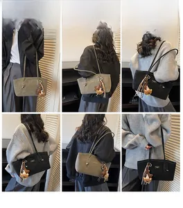 Vues multiples d'un sac cabas vintage pour femme en similicuir givré vert et noir