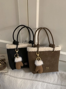 Winter faux suede bucket bag with shearling trim and plush glove charm decoration