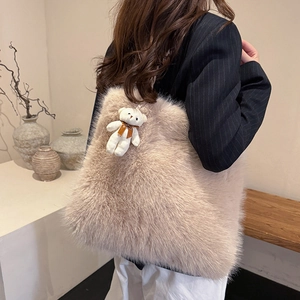 Chic large fuzzy faux fur tote bag in creamy beige with cute white teddy bear charm