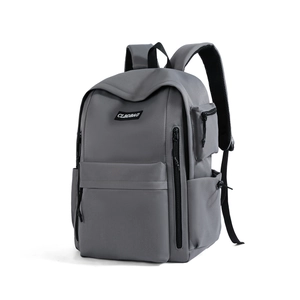 Grey lightweight travel backpack showing side pockets and wide padded shoulder straps