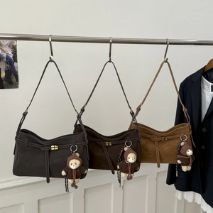 Retro matte suede tote bag in various brown shades with bear pendant and gold buckle