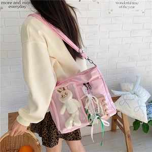 Borsa Ita rosa con finestra trasparente, peluche a forma di coniglio bianco e fiocchi