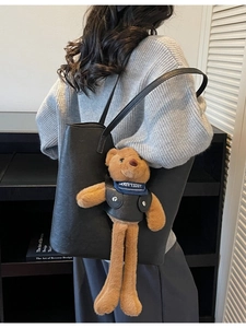 Retro black leather bucket bag with cute plush bear charm for autumn and winter daily use