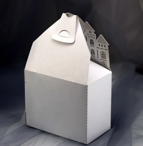 Elegant white pearl paper wedding gift box with laser-cut castle design and handle