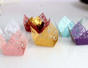 Laser-cut hollow floral cupcake wrappers in multiple colors for wedding party favors