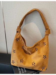 Minimalist ginger yellow hollow floral hobo bag with wide shoulder strap in matte finish