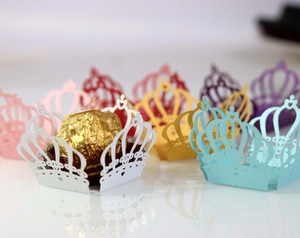 Laser-cut crown hollow paper chocolate liners in various colors with heart details