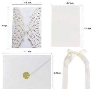 Laser-cut butterfly wedding invitation set with white cards and cream ribbon