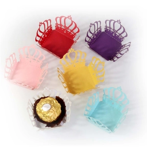 Laser cut crown candy box liners for weddings in six vibrant colors on white background