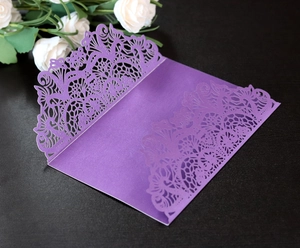 Deep purple laser cut wedding invitation sleeve with intricate mandala lace pattern