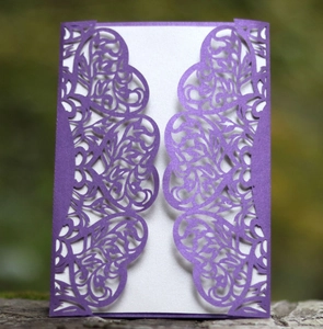 Elegant purple laser cut wedding invitation with heart pattern and white insert card