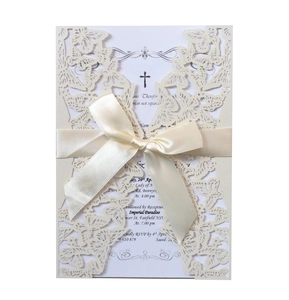 Laser-cut butterfly wedding invitation card with ivory ribbon and elegant hollow pattern