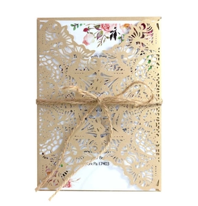 Laser cut lace wedding invitation card with floral inner sheet and decorative twine cord