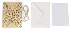 Detailed laser-cut hollow lace wedding invitation set with kraft paper and hemp rope