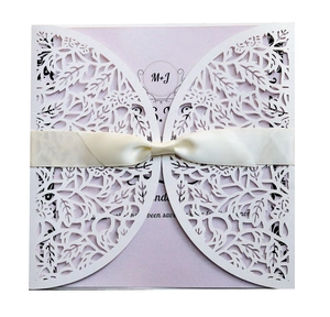 Laser-cut white wedding invitation with pink insert card and silk ribbon bow set