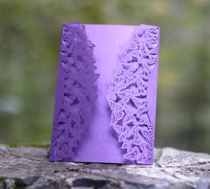 Detailed laser-cut purple butterfly invitation card with premium pearlescent shimmer texture