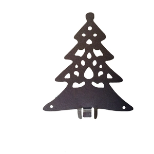 Black metal laser-cut Christmas tree table decoration with elegant hollow pattern
