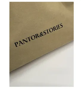 Detail of khaki canvas fabric texture with black PANTOR&STORIES printed typography
