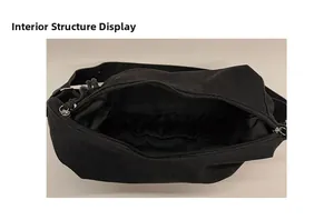 Detailed interior view showing large capacity and structure of black canvas crossbody bag