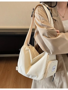 Chic beige checkered canvas backpack with large capacity and lightweight travel shell design
