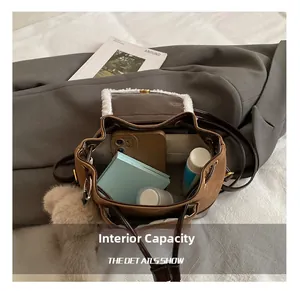 Internal capacity of the vintage brown leather backpack with plush trim showing daily items